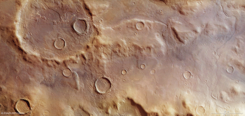 Illustration for article titled Stunning New Close-Ups Of The Largest Crater On Mars